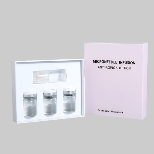 Vellura Microinfusion System – microneedling device with glass serum bottle on a white background

