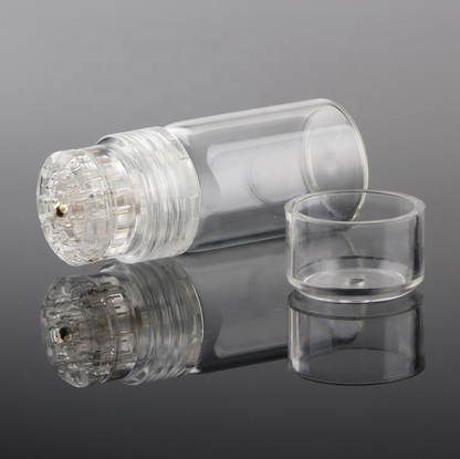 Clear cylindrical light bulb with a reflective surface on a gray background